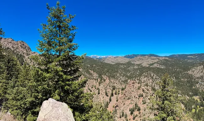 Eldorado Canyon State Park: Rattlesnake Gulch trail view from the Continental Divide of the distant Front Range Mountains