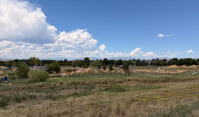 Open space view to the playground, McKay Lake Park, and Open Lands
