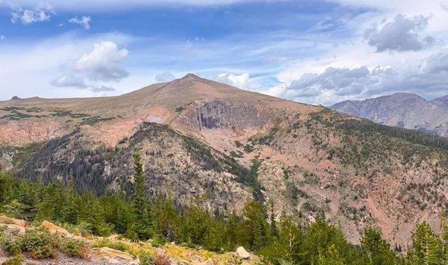 Rocky alpine ridge and mountain peaks viewed from Trail Ridge Road in Rocky Mountain National Park
