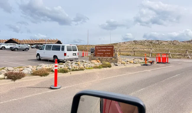 Alpine Visitor Center and Trail Ridge Store sign beside the parking area on Trail Ridge Road