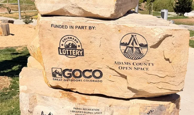 Stone recognition monument at Westminster Station Park Nature Playground