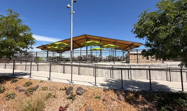 Accessible ramp leading to the covered pavilion picnic area at Westminster Station Park