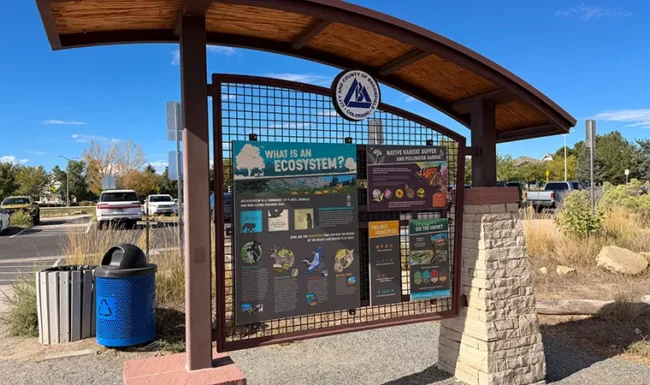 Native habitat and ecosystem interpretive sign at McKay Lake Park and Open Lands in Broomfield, Colorado