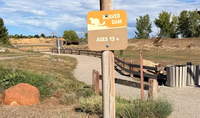 Beaver Dam play-feature sign for ages 13 and up at McKay Lake Park in Broomfield