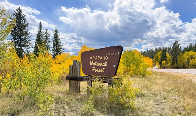 Arapaho National Forest sign along a mountain road near Black Hawk, Colorado