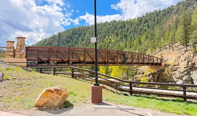 Pedestrian & biking bridge over a road in Black Hawk, Colorado, at the Hidden Treasure Trailhead
