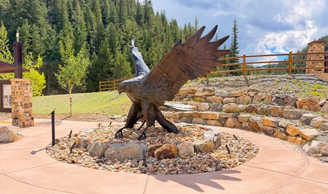 Bronze black hawk sculpture at Hidden Treasure trailhead
