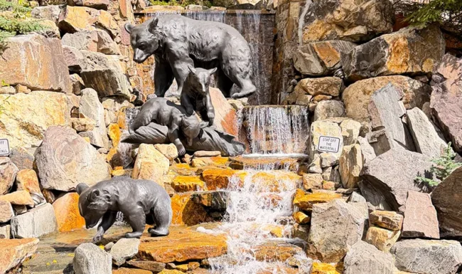 Bronze black bear sow and cubs waterfall sculpture: Mountain Life Park in Black Hawk, Colorado