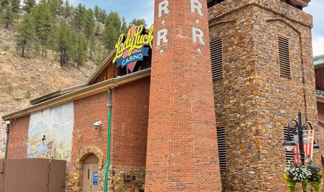Historic Colorado Central Station red-brick building tower on a downtown Black Hawk street