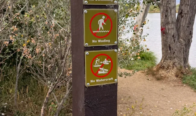 Coot Lake visitor rules and prohibited-activity signs