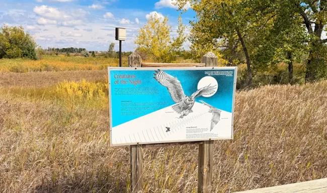 Bird wildlife interpretive sign beside the Coot Lake trail