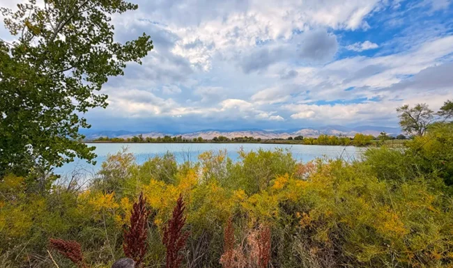 Coot Lake viewed through colorful fall foliage