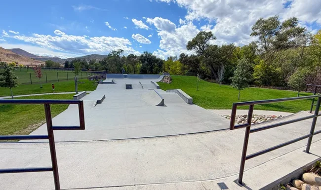 Concrete skate park ramps and rails at Bohn Park in Lyons, Colorado