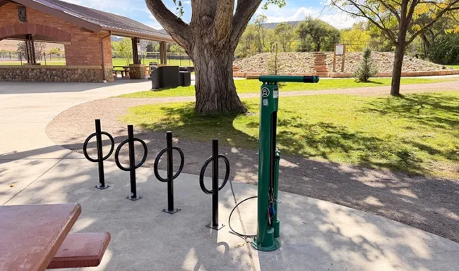 Bicycle repair station and bike racks beside the Bohn Park pavilion in Lyons