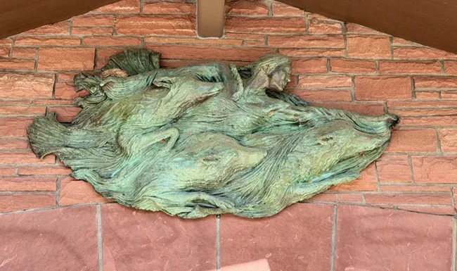 Bronze nature relief artwork on the Bohn Park pavilion in Lyons