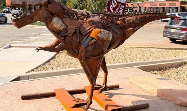 Metal dinosaur sculpture in downtown Lyons, Colorado