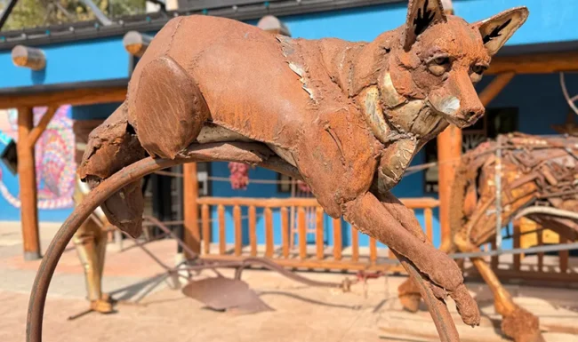 Metal coyote sculpture in downtown Lyons, Colorado
