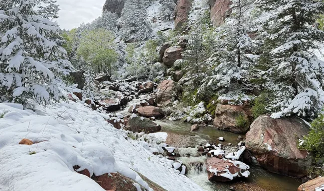 South Boulder Creek flowing through snowy rocks in Eldorado Canyon