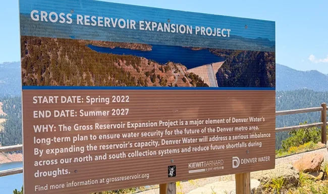 Gross Reservoir Expansion Project sign describing Denver Water’s project and listing a spring 2022 start and summer 2027 end