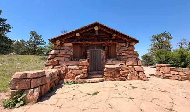 Historic Halfway House on Flagstaff Mountain in Boulder, with stone walls, log beams and a stone terrace