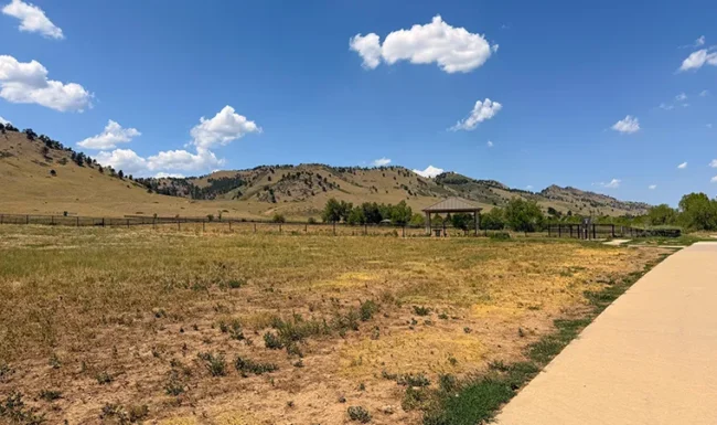 Open space, walking path and foothill scenery at Foothills Community Park in Boulder Colorado