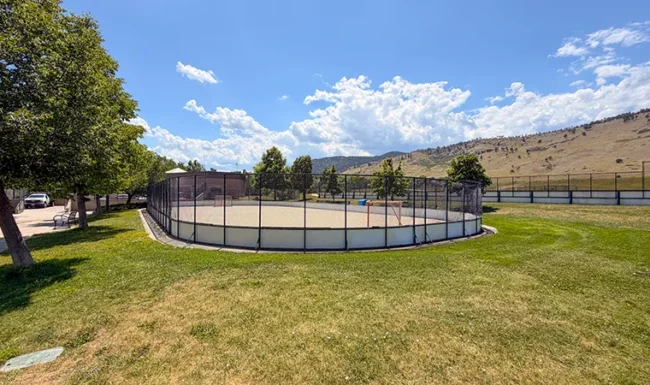 Fenced inline hockey rink at Foothills Community Park in Boulder Colorado