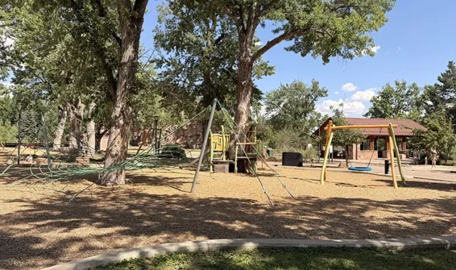 Rope climbing structure, swings and playground at LaVern M. Johnson Park